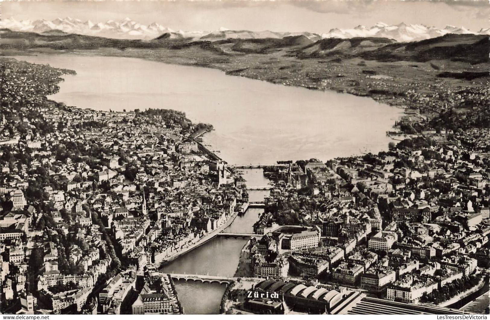 [-10%] SUISSE - Zurich - vue aérienne - rivière Limmat - lac de Zurich - ponts - bâtiments - rue - Alpes suisse - Carte