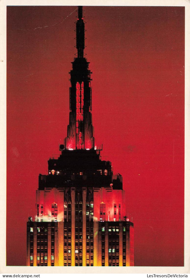 [-15%] ETATS UNIS - New York - The Empire States Building at night illuminated - Visible for 50 miles - Carte postale