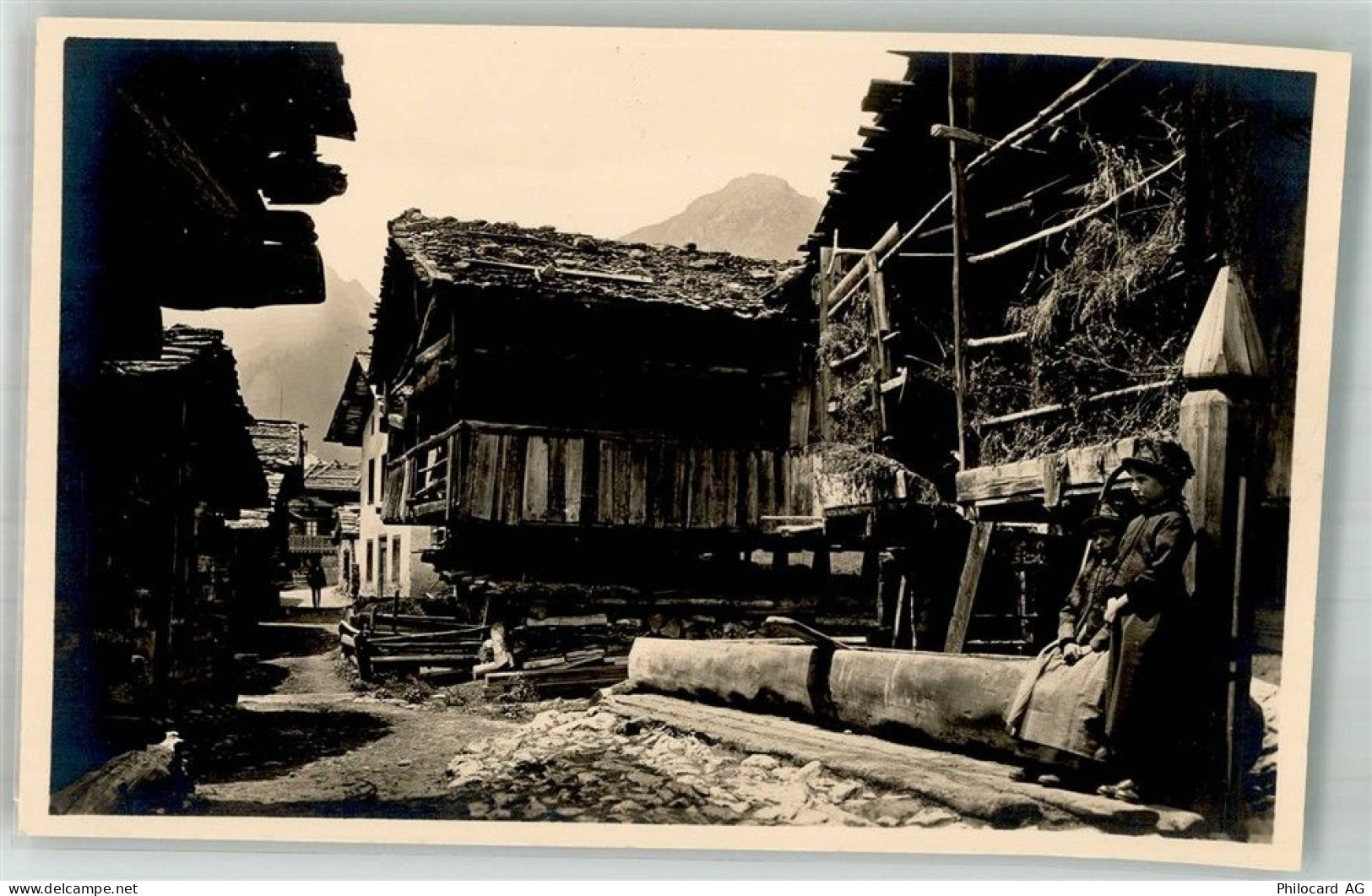 3917 Kippel Foto AK Tracht Dorfstrasse - 38245594