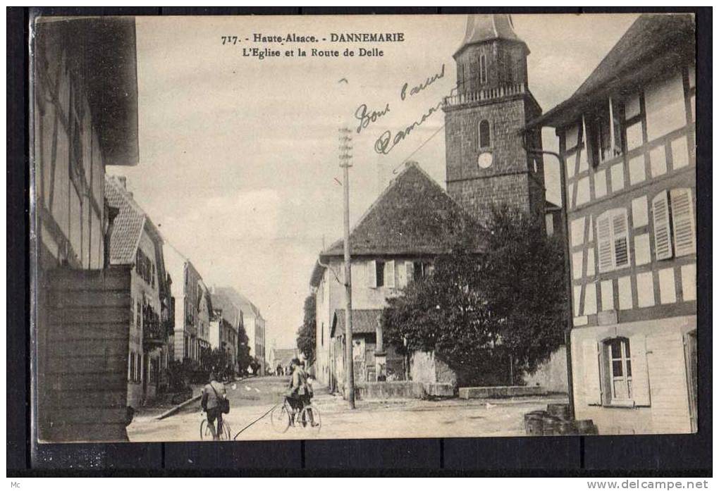68  - Dannemarie - L'Eglise et la Route de Delle - Animée - Vélos