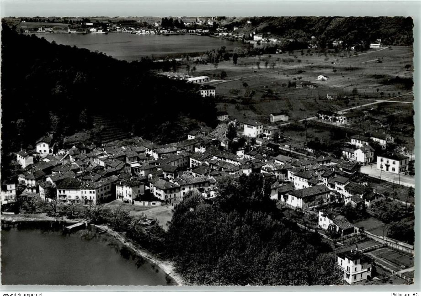 6987 Caslano - Veduta aerea Caslano verso Ponte Tresa Fliegeraufnahme - 13127611