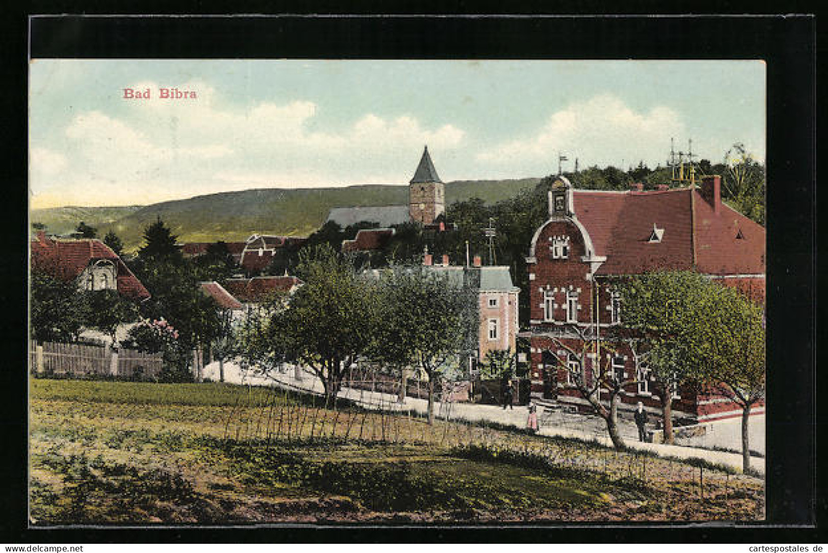 AK Bad Bibra, Strassenpartie mit Kirche