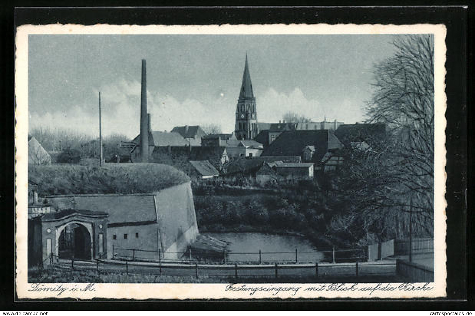 AK Dömitz i. M., Festungseingang mit Blick auf die Kirche