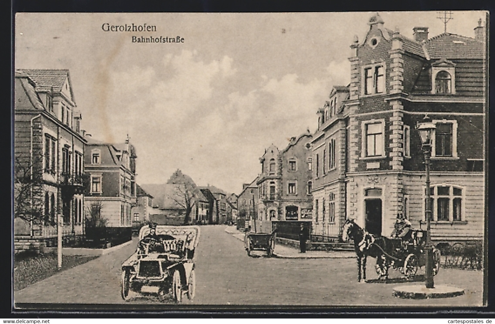AK Gerolzhofen, Bahnhofstrasse mit Pferdewagen
