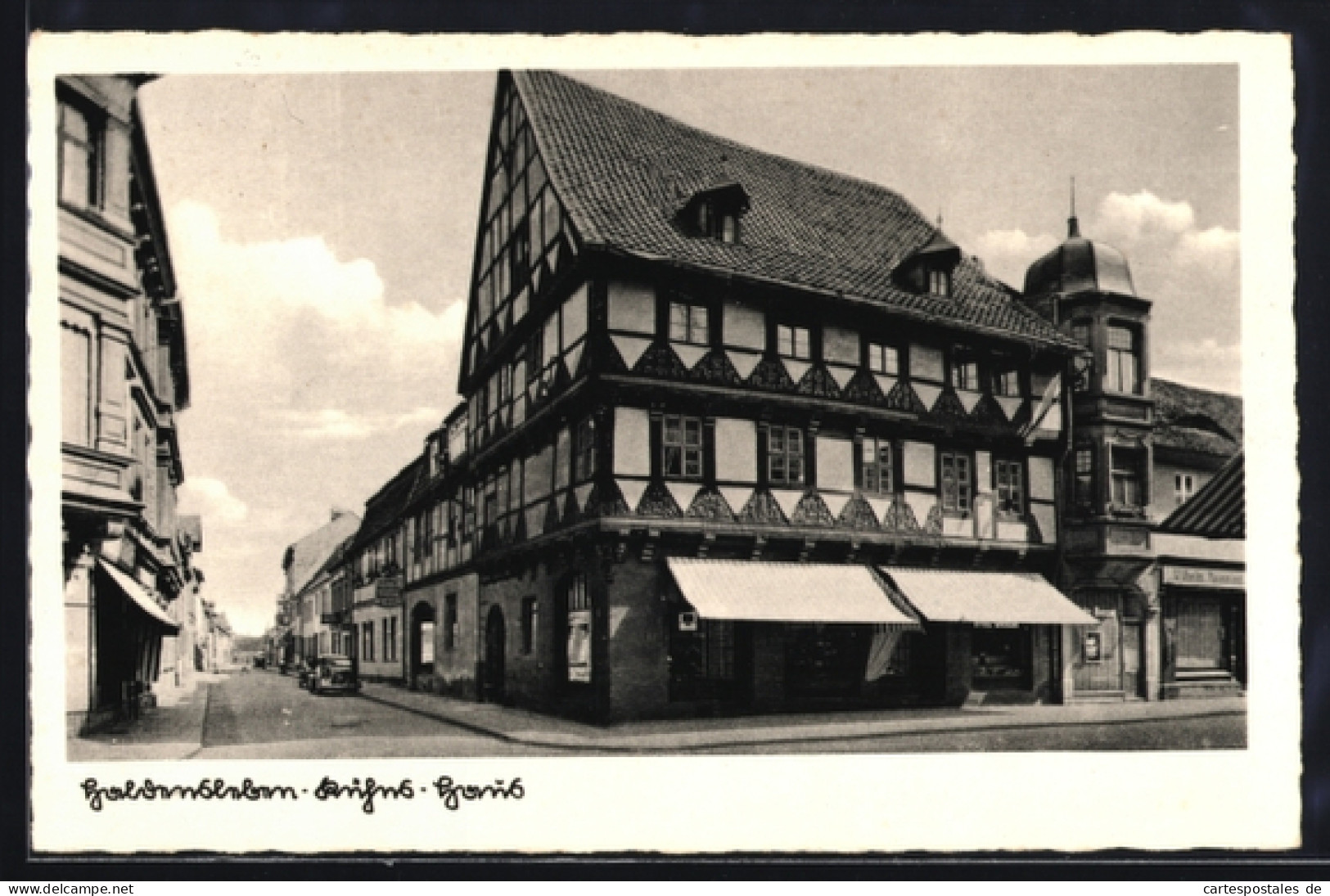AK Haldensleben, Kühns Haus mit Strassenpartie