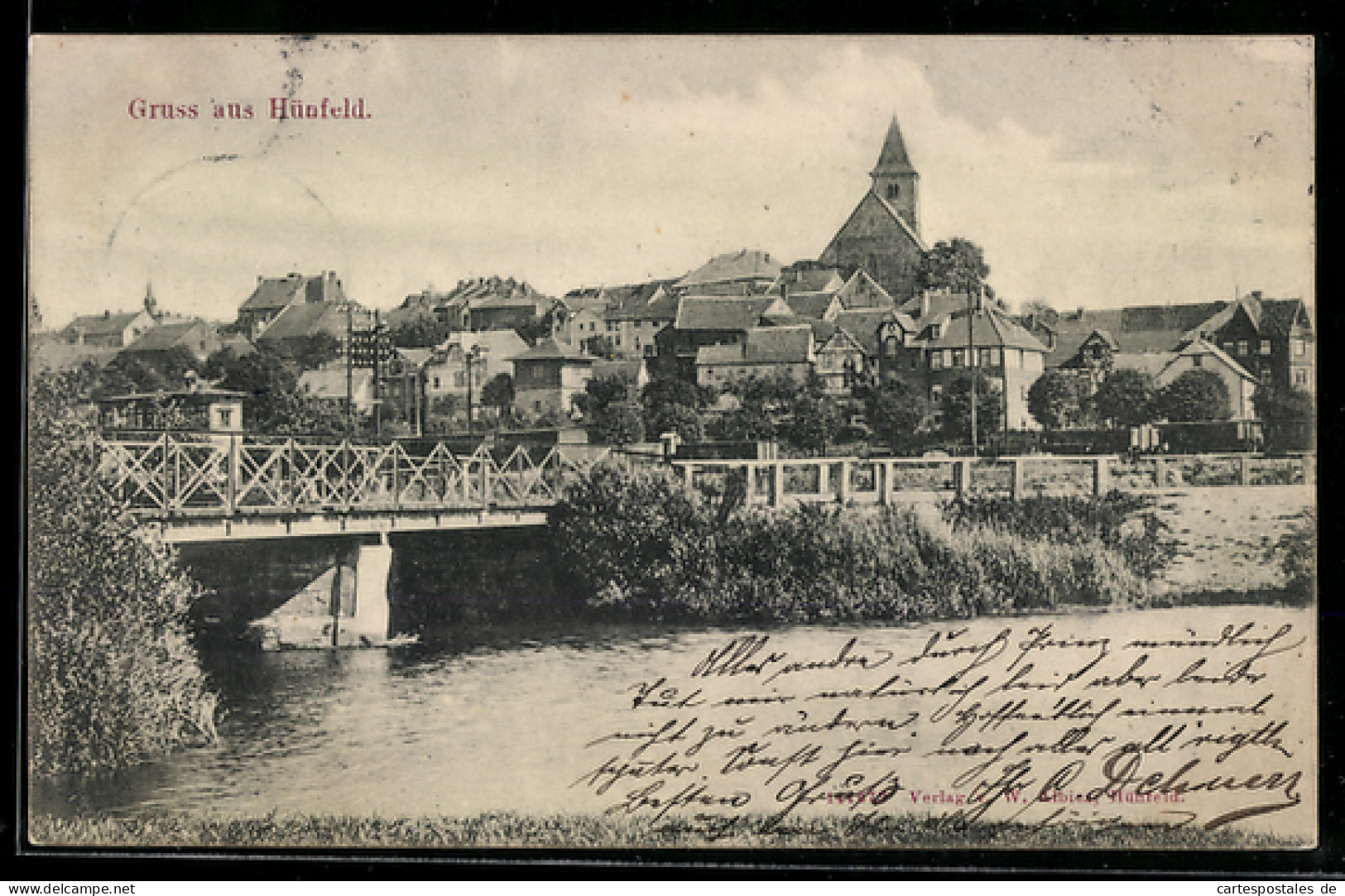 AK Hünfeld, Ortsansicht mit Brücke und Fluss