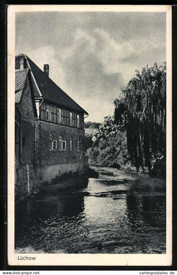 AK Lüchow / Dannenberg, Flusslauf mit Fachwerkhaus