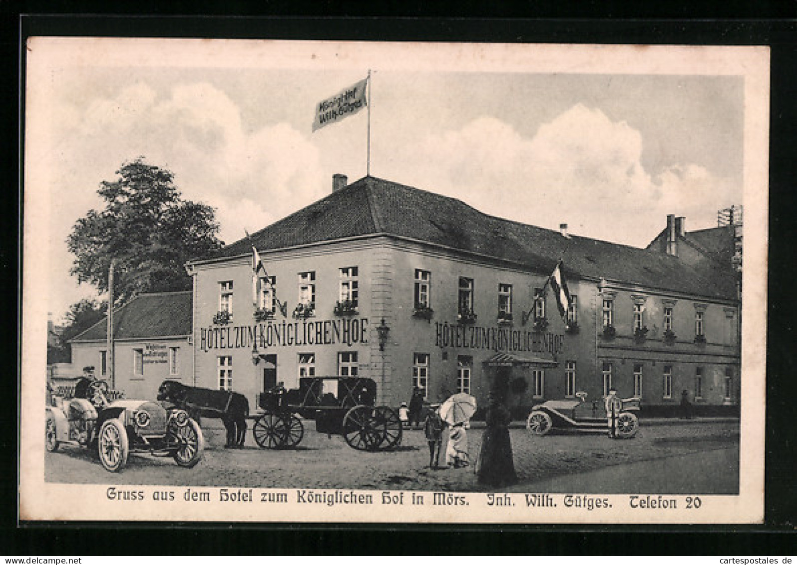 AK Mörs, Hotel zum Königlichen Hof Wilh. Gütges mit Kutschen und Automobilen