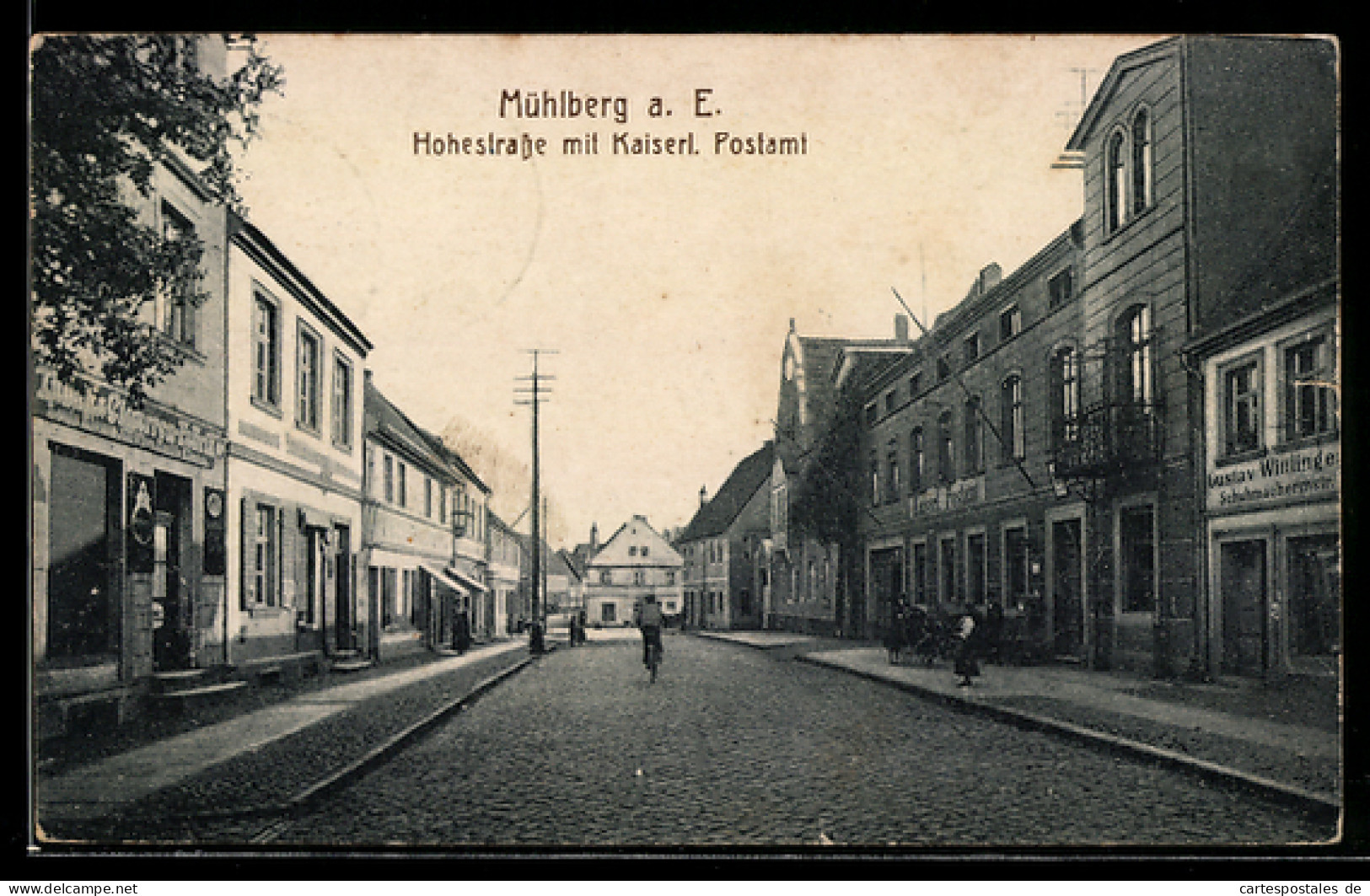 AK Mühlberg a. E., Hohestrasse mit Kaiserl. Postamt