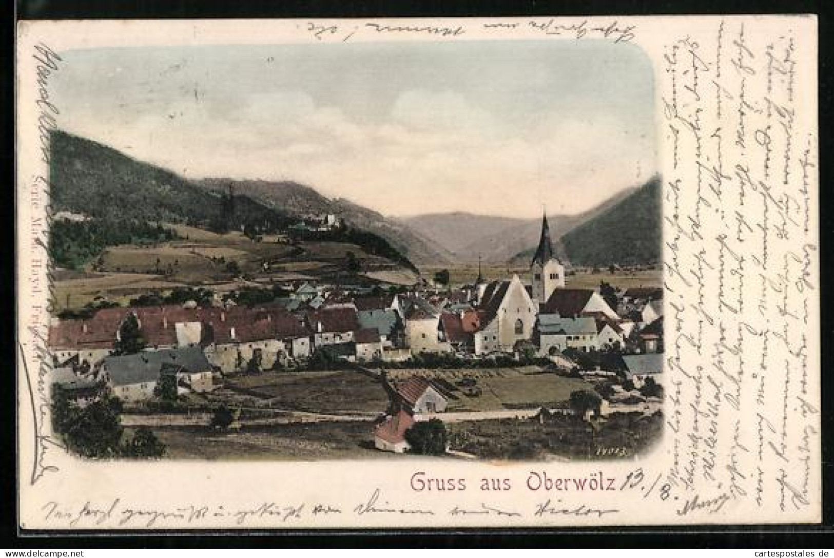 AK Oberwölz, Ortsansicht mit Blick auf die Berge