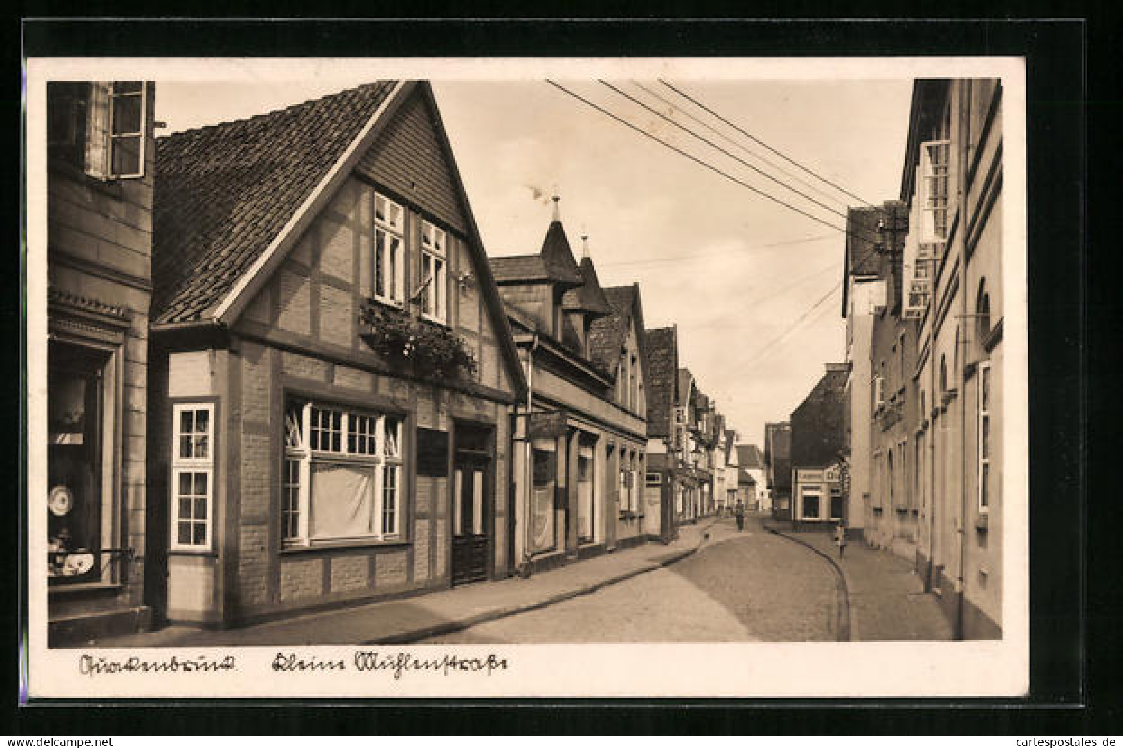 AK Quakenbrück, Kleine Mühlenstrasse mit Geschäften