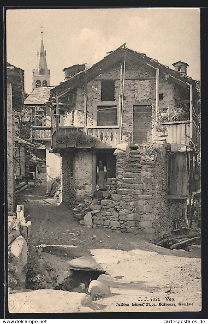 AK Vex, Altes Haus, über den Dächern der Kirchturm