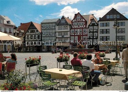 Butzbach Marktplatz Strassencafes Brunnen Fachwerkhaeuser Altstadt