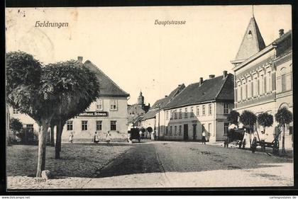 AK Heldrungen, Hauptstrasse mit Gasthaus zum Schwan