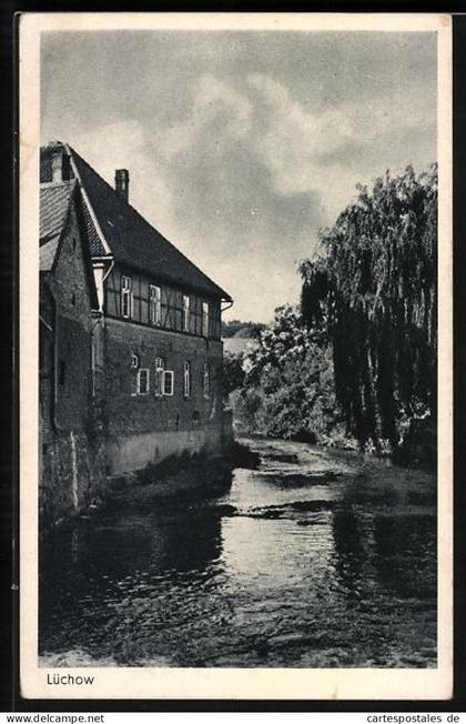 AK Lüchow / Dannenberg, Flusslauf mit Fachwerkhaus