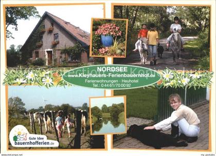 Wangerland Nordsee Kleyhauers Ferienbauernhof Kind Hund Kuehe Pferde