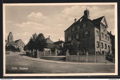 AK Buchloe, Strassenpartie mit Kirche