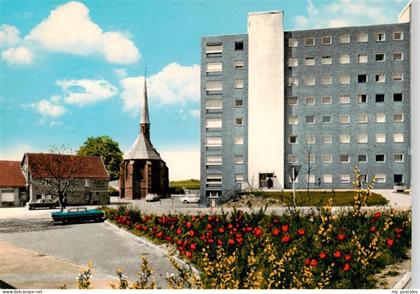 Monheim Rhein Marienkapelle mit Hochhaus