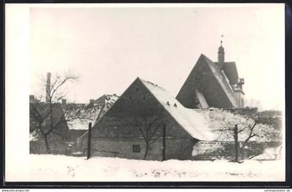 Foto-AK Zörbig, Kirche und verschneite Häuser