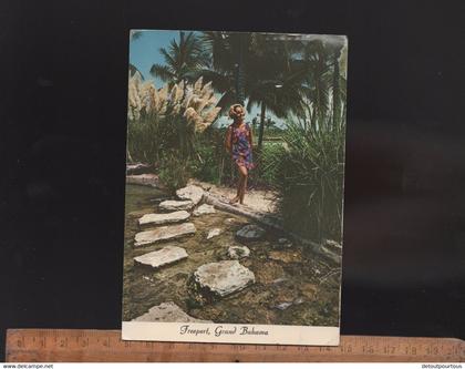 FREEPORT GRAND BAHAMA Bahamas : woman in the garden of the KING's INN HOTEL