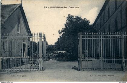 Medea, La Caserne
