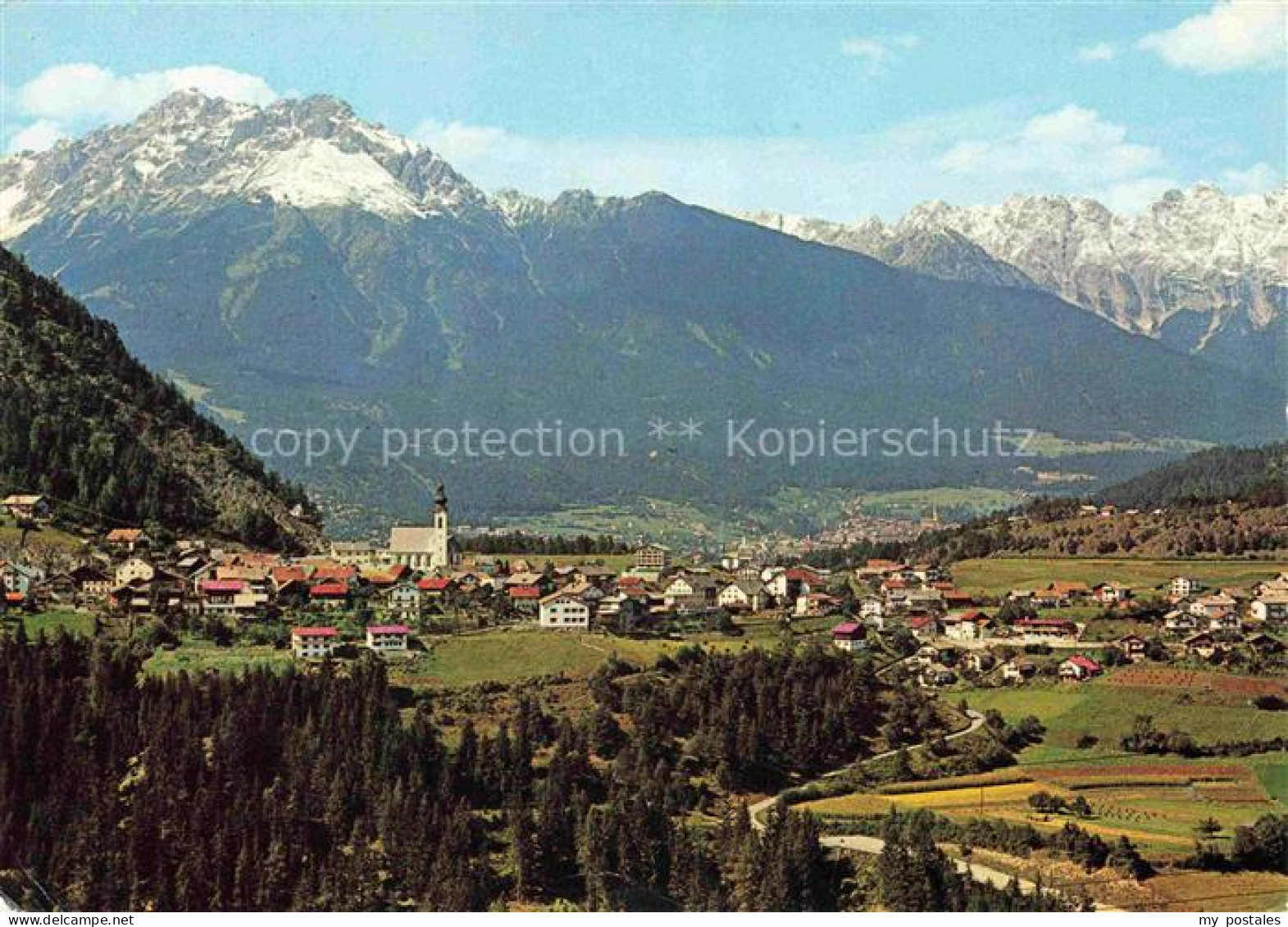 Arzl Pitztal Tirol AT Dorfansicht Kirche Bergpanorama Pitztal Haeuser Felder Wal