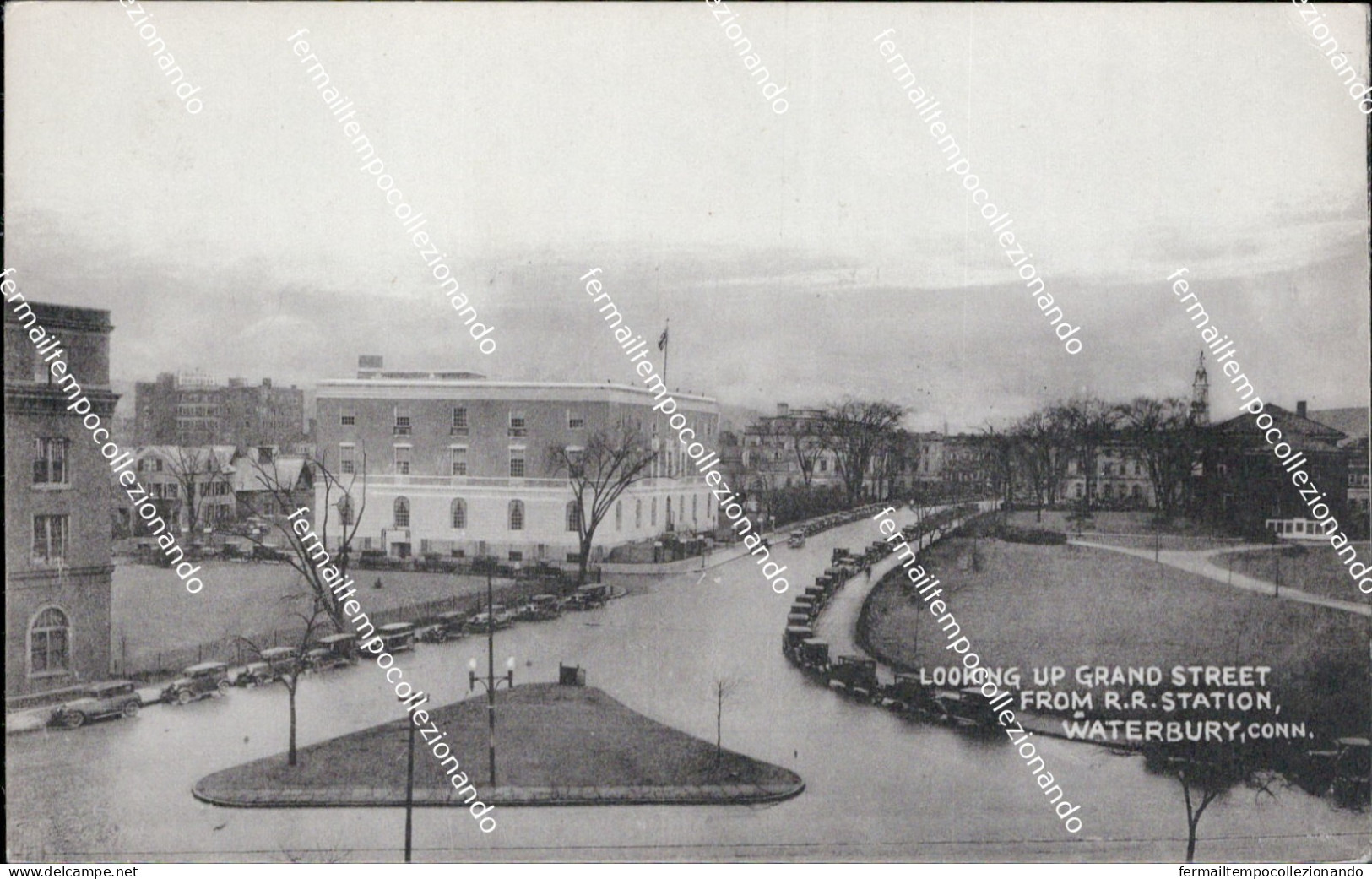 au252 cartolina looking up grand street from r.r.station waterbury