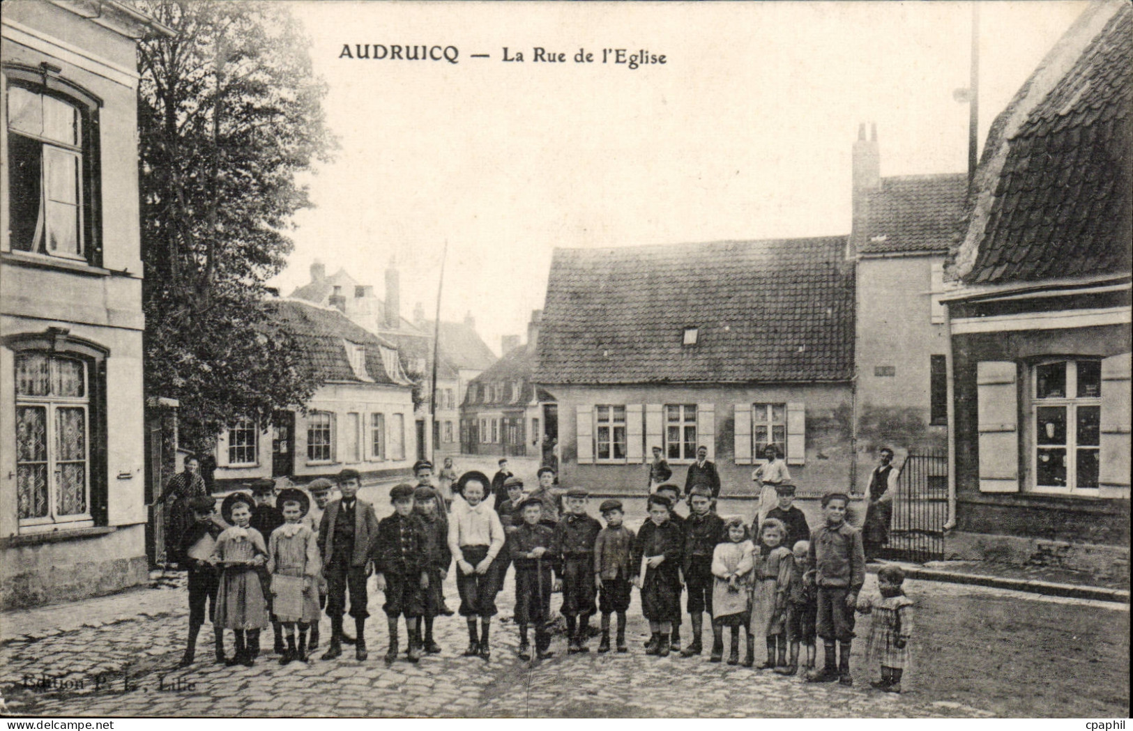 Audruicq CPA Le rue de l'eglise