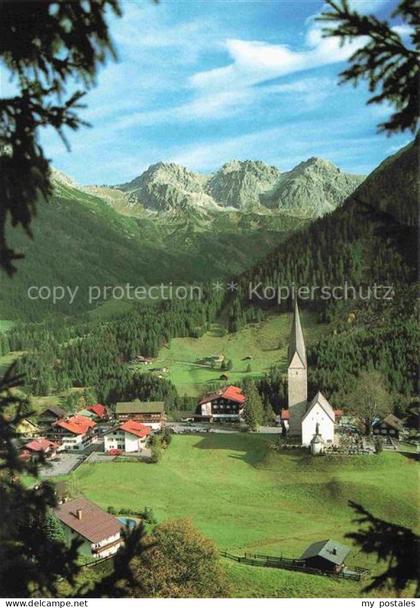 MITTELBERG  Kleinwalsertal AT Kleinwalsertal Schafalpkoepfen Bergdorf Kirche Alp