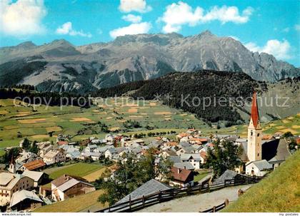 Nauders Tirol mit Kirche und Piz Mandin
