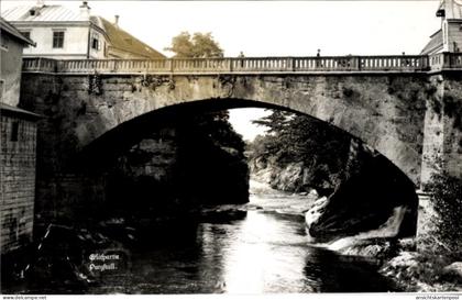 CPA Purgstall an der Erlauf in Niederösterreich, Steinbogenbrücke über Fluss, felsige Ufer, Häuser