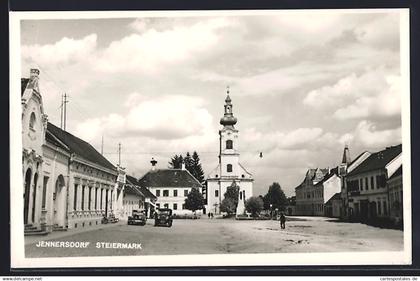 AK Jennersdorf /Steiermark, Strassenpartie mit Blick zur Kirche