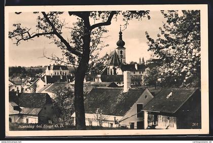 AK Sierning bei Steyr, Ortspartie mit der Kirche über Dächer hinweg