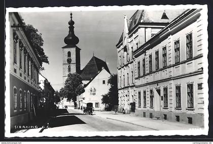 AK Sierning /O.-Oe., Strassenpartie mit Raiffeisenkasse