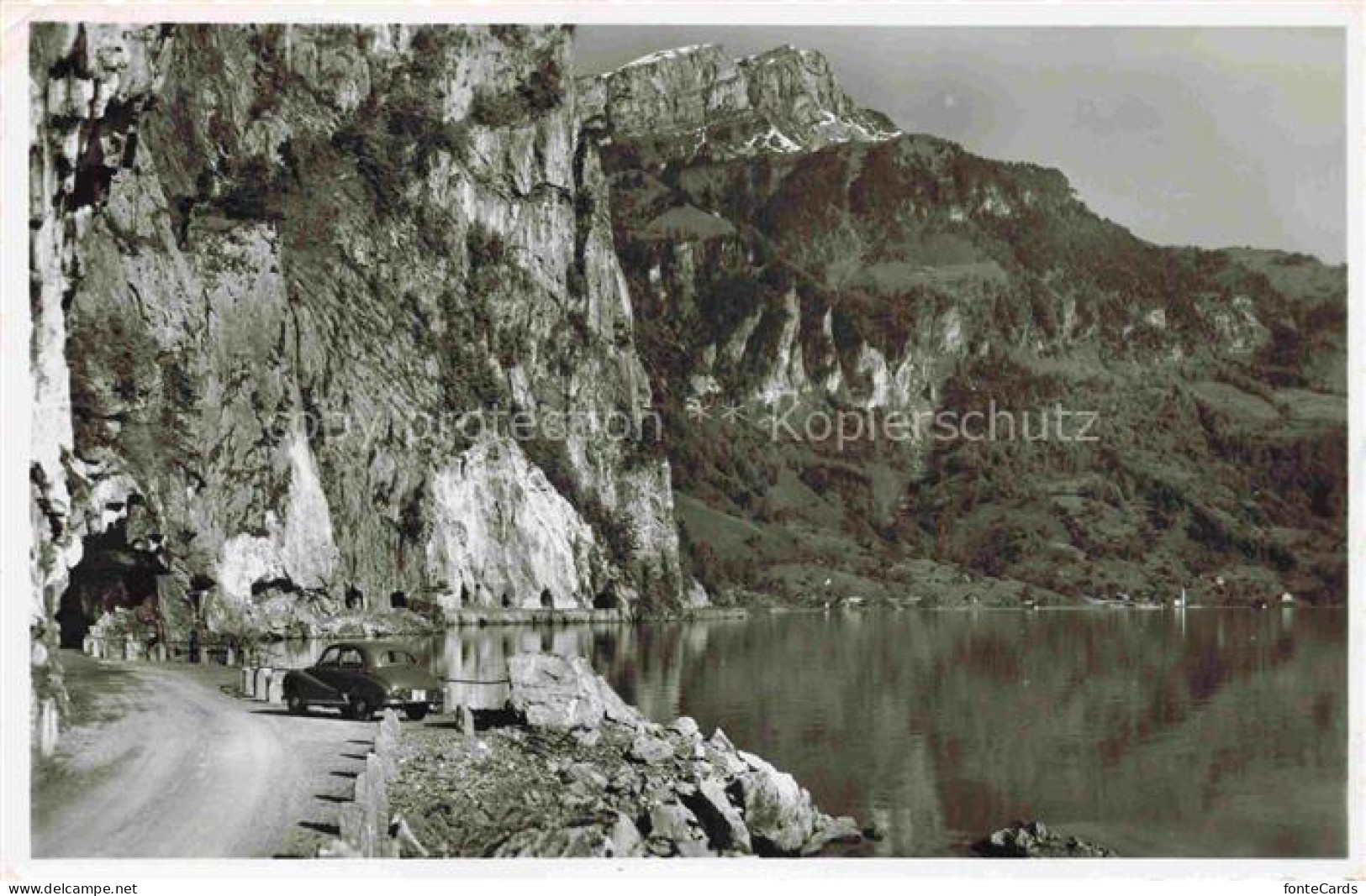 Bauen URI UR Vierwaldstaettersee Bauenstock Felsen Seeufer Strasse Auto Berge
