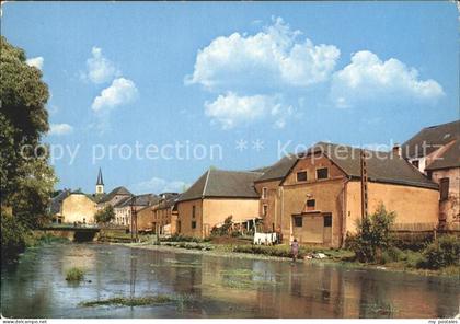 Martelange Haeuser am Fluss