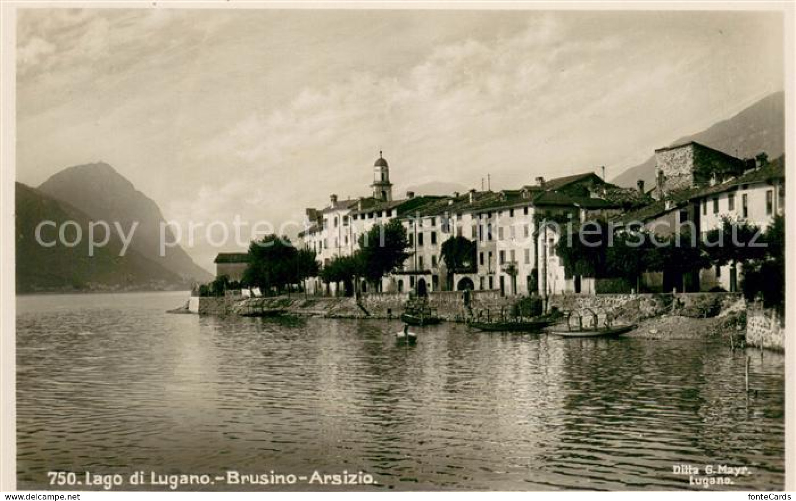 Brusino Arsizio TI Haeuserpartie am Luganersee