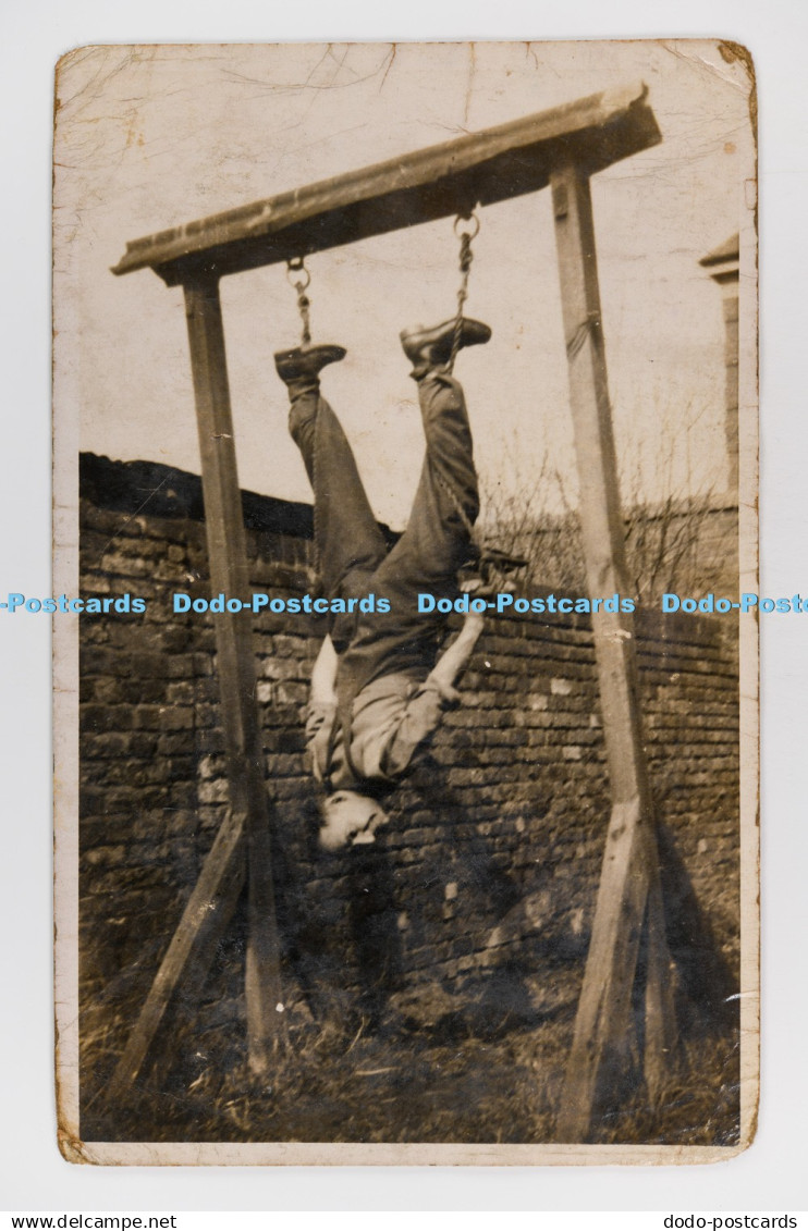 C029870 Man Hanging Upside Down Postcard
