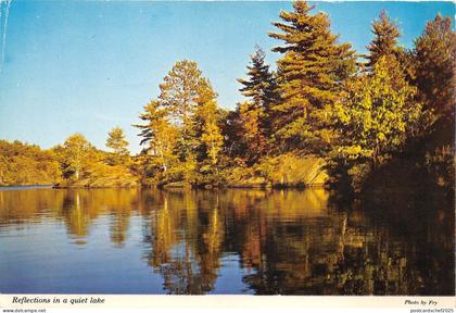 BG20977 ah wilderness reflections in a quiet lake   canada