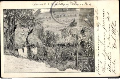CPA Medellin Kolumbien, Wohnhäuser, Strohdächer
