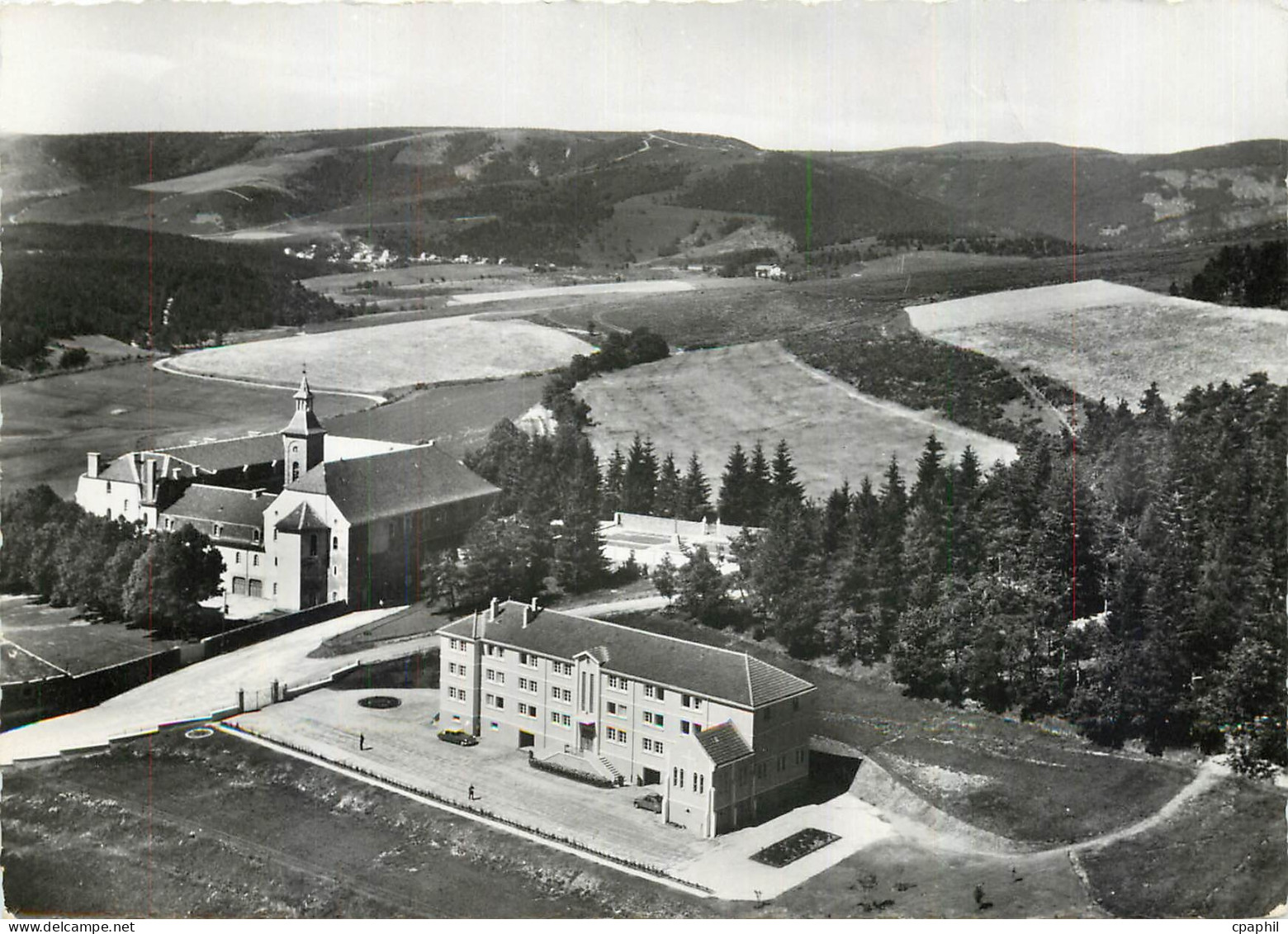 CPM Abbaye Notre Dame des Neiges par la Bastide Lozere Le Monastere dans son cadre boise