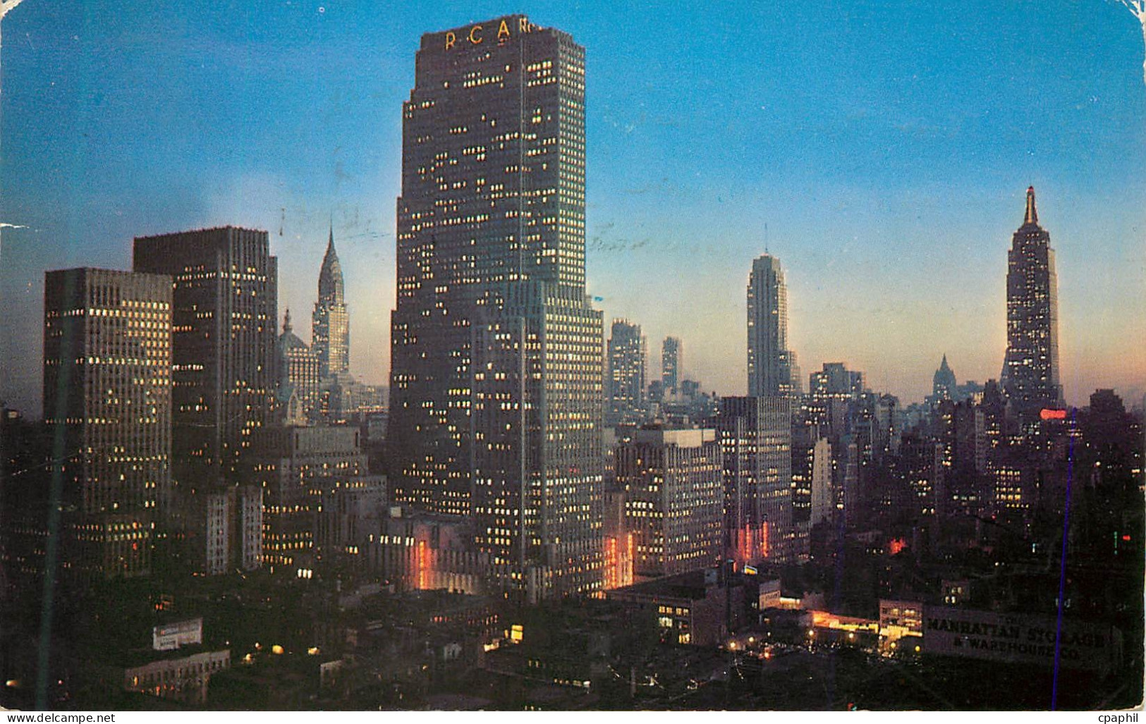 CPM Night Falls on Midtown Manhattan Showing RCA Building Chrysler Building and Empire State Building