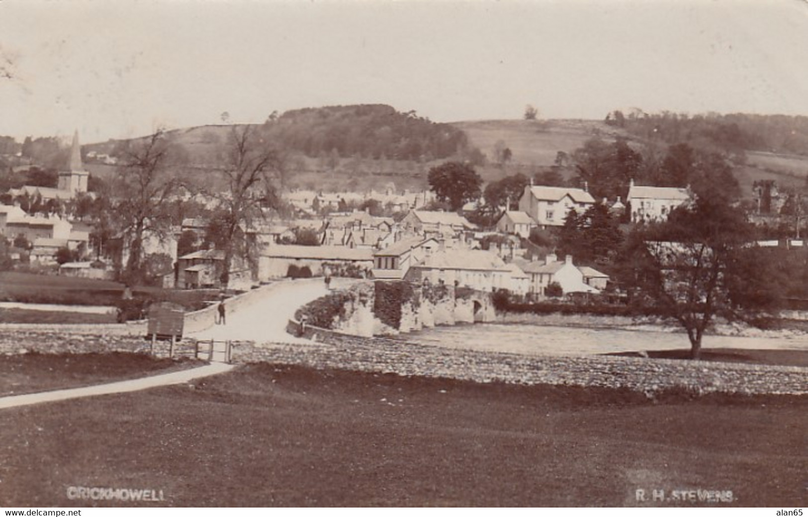 Crickhowell (Wales) UK, View of Village, Man on Bridge, Christmas Greetings on Back, c1900s Vintage Real Photo Postcard