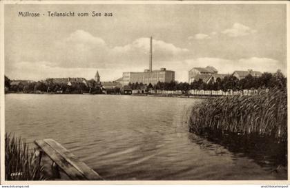 CPA Müllrose in Brandenburg, Teilansicht vom See aus, Fabrikgebäude