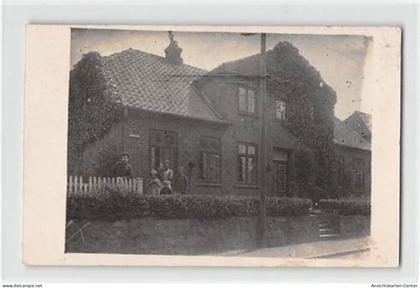 39124873 - Seltene Fotokarte Gettorf. Haus in der Herrenstrasse mit Personen davor. gelaufen. Leichter Stempeldurchdruc