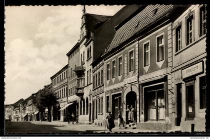 AK Luckau /N.-L., Hauptstrasse mit Geschäften
