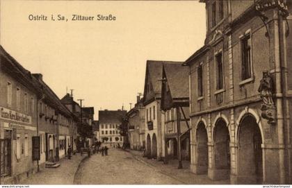 CPA Ostritz in der Oberlausitz, Zittauer Straße, Kolonialwarenhandlung, Maler Lackierer Gustav Kern