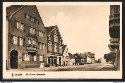AK Gütersloh, Berlinerstrasse mit Geschäft