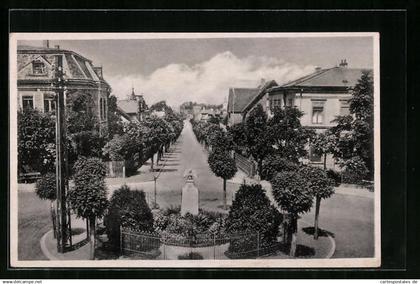 AK Ortrand, Bahnhofstrasse mit Kriegerdenkmal 1870 /71