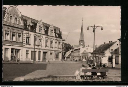 AK Torgelow /Krs. Ückermünde, Luxuswarengeschäft und Kirche am kleinen Markt